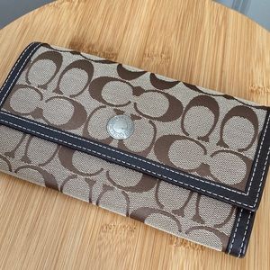 Trifold Coach wallet.